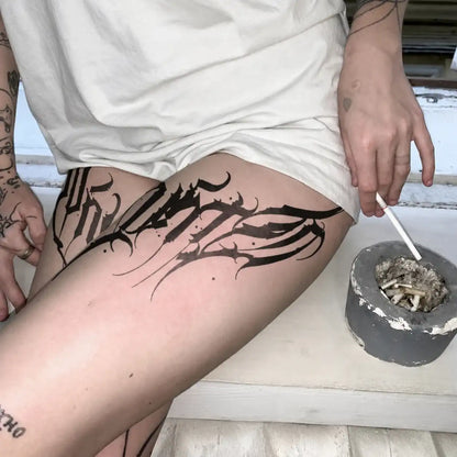 Wing Thorn Leg temporary tattoo — Yuka Ink